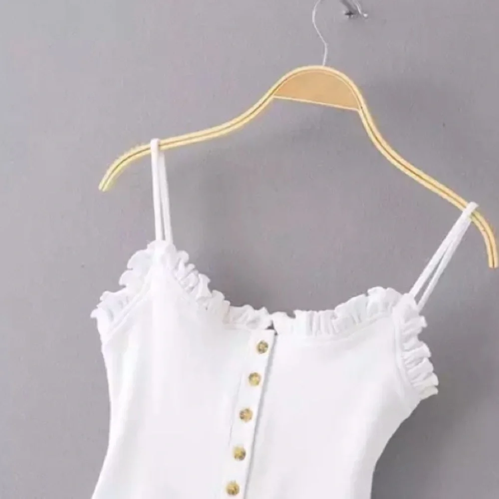 SOLD OUT The Cutest White Ribbed Button Ruffled Bodysuit - Picture 6 of 7